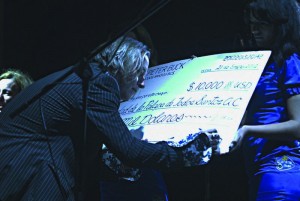 Peter Buck sign check at the First Todos Santos Music Festival